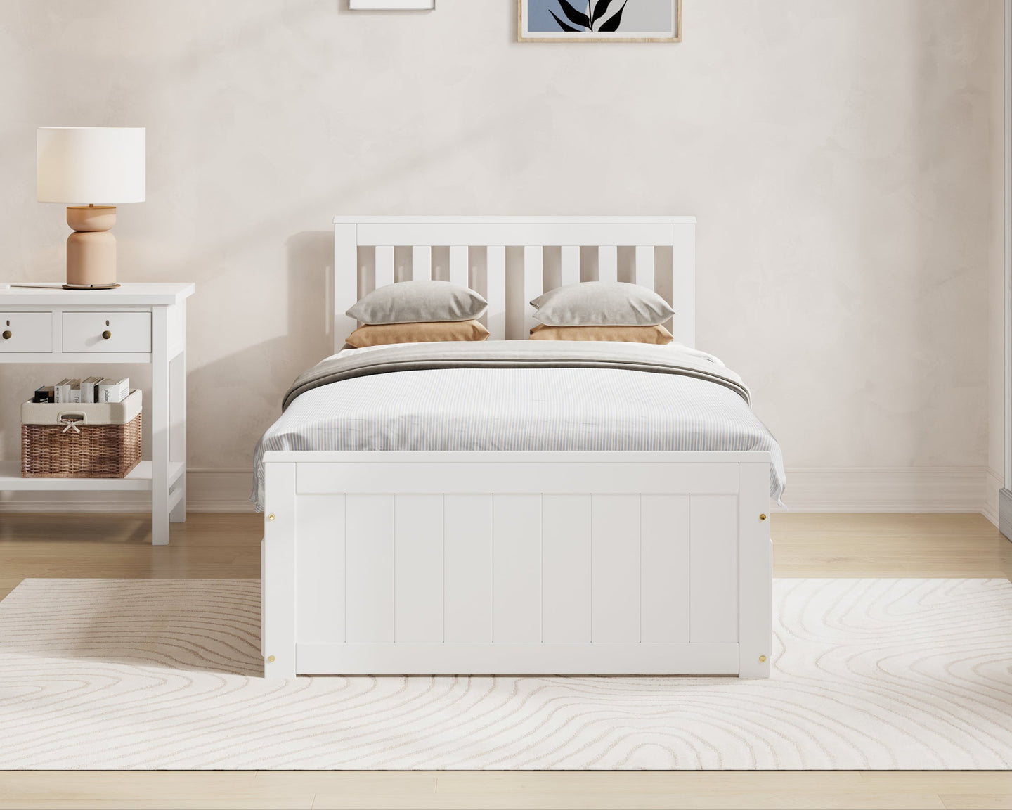 White bed in a bedroom with 'Millie & Jones' branding on the wall.